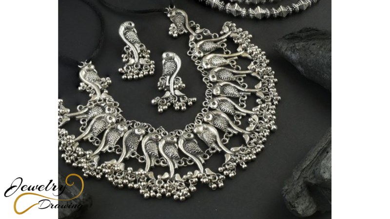 Gorgeous leaf design with hanging bell combination silver oxidized jewellery set