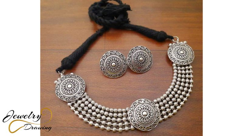 The circular object with round shape combination designer oxidized silver jewellery set