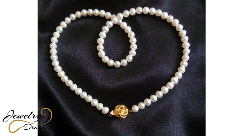 Simple pearl chain with gold design attachment