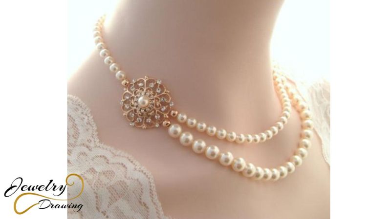 Goldish pearl and floral design combination necklace